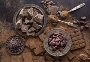 chocolate with plate cocoa beans 1 | Ăn Chay, Thuần Chay, Quán Chay & Nhà Hàng Chay